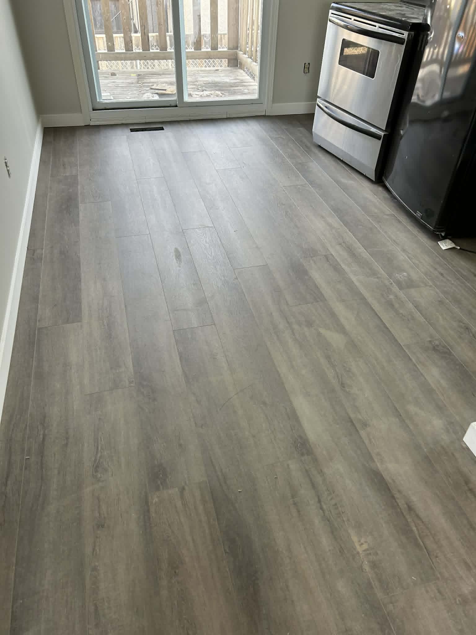 Dark laminate flooring in elegant dining room